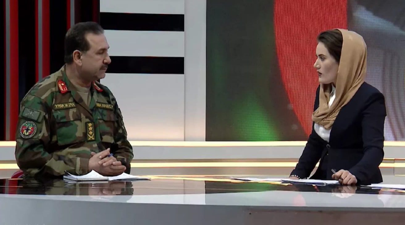 Zahra working in her previous job as a news presenter in Afghanistan